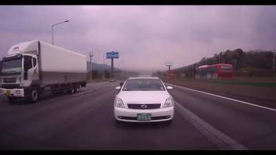 Bus Tries to "Monster Truck" His Way Through Traffic