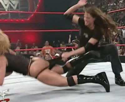 Stephanie stripping &amp;amp; spanking Trish Stratus