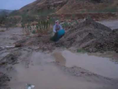 Boogie boarding over a mud puddle, WCGW?