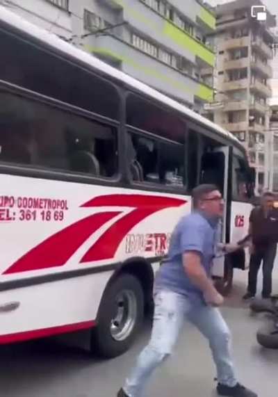 Guy comes off the bus wielding a machete
