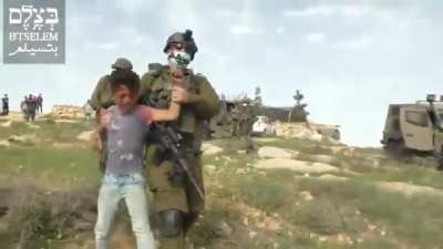 Israeli Army officers arresting children at the request of settlers.