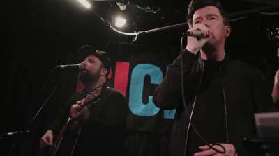 Rick Astley sings "Never Gonna Give You Up" in a small Toronto bar with a giant choir
