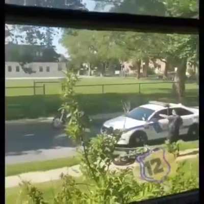 Popping a wheelie in front of the police WCGW