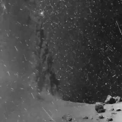 Dust, stars, and cosmic rays swirling around Comet 67P/Churyumov&ndash;Gerasimenko, captured by the Rosetta probe.