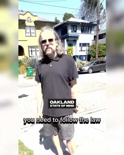 Man and family argue about riding bikes on a sidewalk