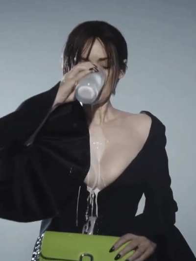 Winona Ryder spilling milk