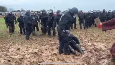 german riot police defeated and humiliated by some kind of mud wizard