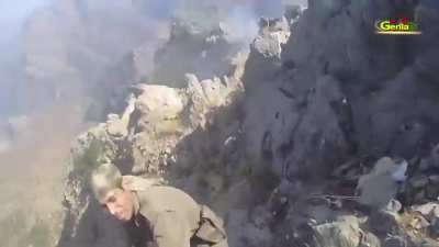Kurd militia men attack a Turkish Special Forces position and kill several Turks. NSFW close kill on camera.