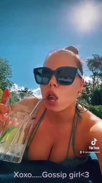 Sunbathing in her bikini