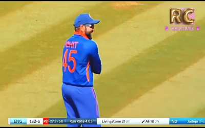 Rohit Sharma adjusting his dislocated shoulder on field