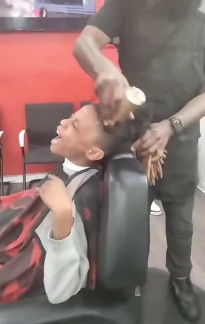 This father&rsquo;s son was misbehaving so he decided to cut off his locs as punishment