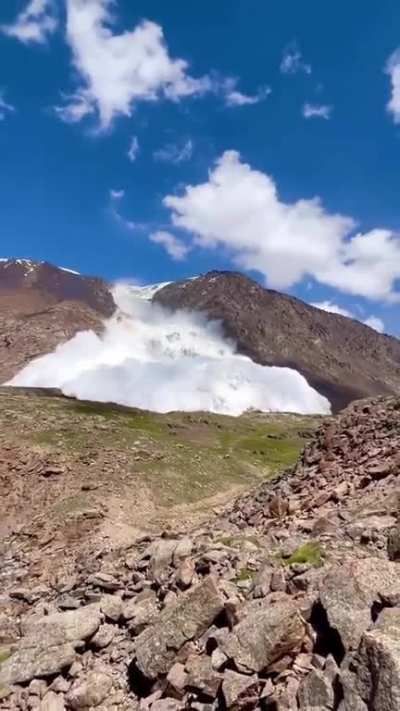 9 Brits and 1 American seek shelter for an enormous avalanche on the Tian Shan mountains in Kyrgyzstan.