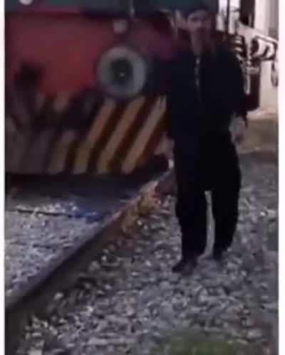 Wcgw! walking in front of a oncoming TRAIN!