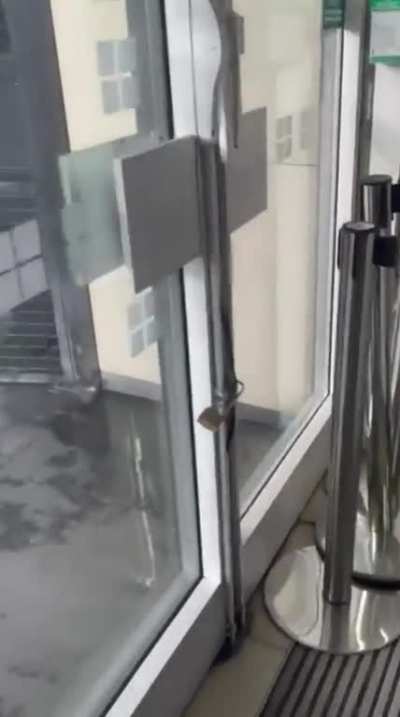 Man sets up cups in for people to piss in and drinks them