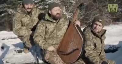 "Shchedrik" (Carol of the Bells) song performed by the commander of the 2nd battalion of the 67th OMBr Zurab Chikhalidze, Ukrainian and Georgian soldiers, brothers and sisters from other units