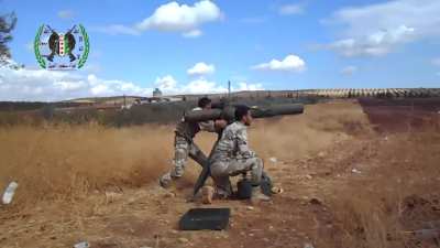 FSA BGM-71 TOW team sets up & attempts to engage an SAA tank as it reverses over a hill - Morek - 10/27/2015