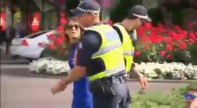 Karen pushes a Cop and gets arrested.
