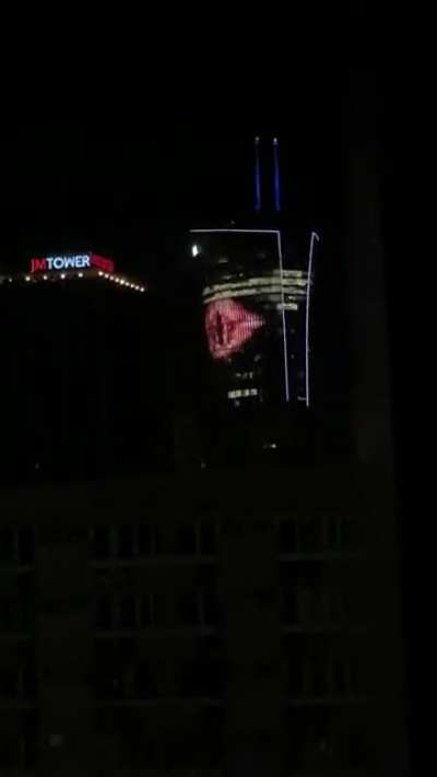 The Eye of Sauron being displayed on the Samsung building in Warsaw