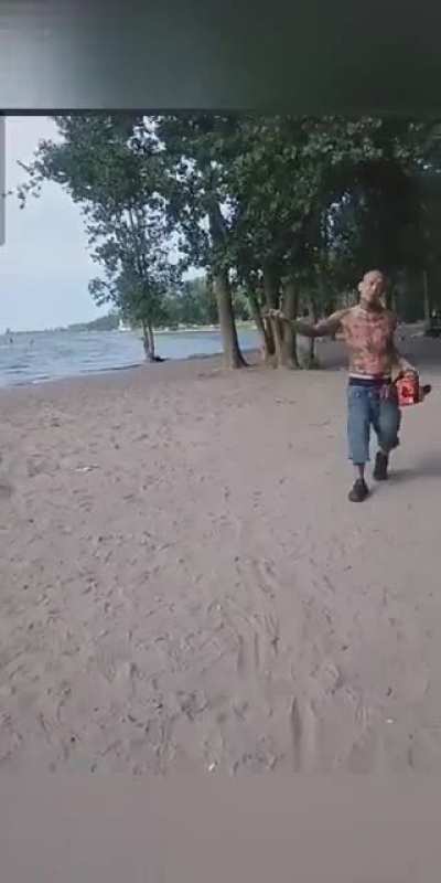 Two insane dudes with chainsaws (Toronto)