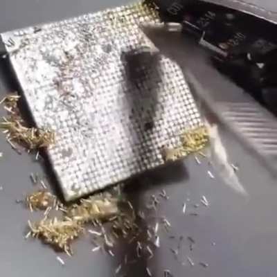 Be sure to clean off the yellow manufacturer pins before installing CPU