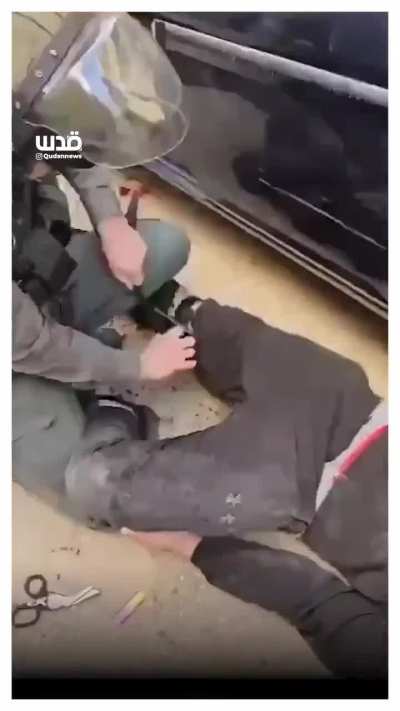 Israeli soldier tests a weapon on an unarmed young palestinian leg.  Then they call an ambulance and treat his leg because they are the most moral army in the world.  NSFW