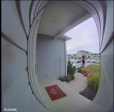 Uber Eats driver drops food off, comes back to pick the food up, then tosses the food and flips off the camera. [OC]