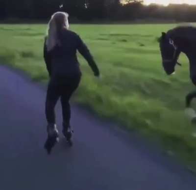 Girl and her horse on an evening stroll together