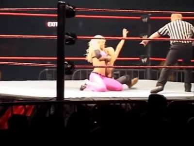Torrie choking out Trish at a House Show!