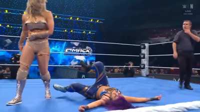 Tiffany successfully countering Bayley and defeating her to retain hee belt