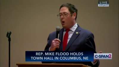 Woman to Rep. Mike Flood at his town hall - 