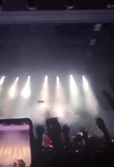 Juice Throwing allys cake at a concert