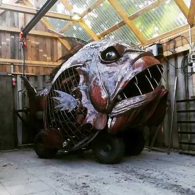 This stunning giant fish is a kinetic sculpture made by the artist Maarten van halderen, based in Raamsdonk, the Netherlands.