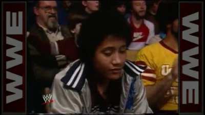 11 year old Dwayne "The Rock" Johnson sitting in the crowd watching his father about to wrestle, 1984.