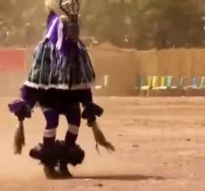 This dance is called -Zaouli- from the central Ivory Coast.