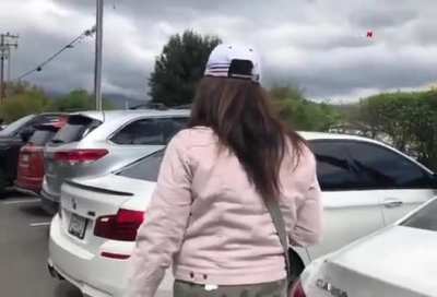 Woman Harassing Ambulance Crew Working on Stabbing Victim
