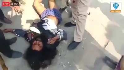 A Sikh protester getting beaten mercilessly by police and supposed "locals".