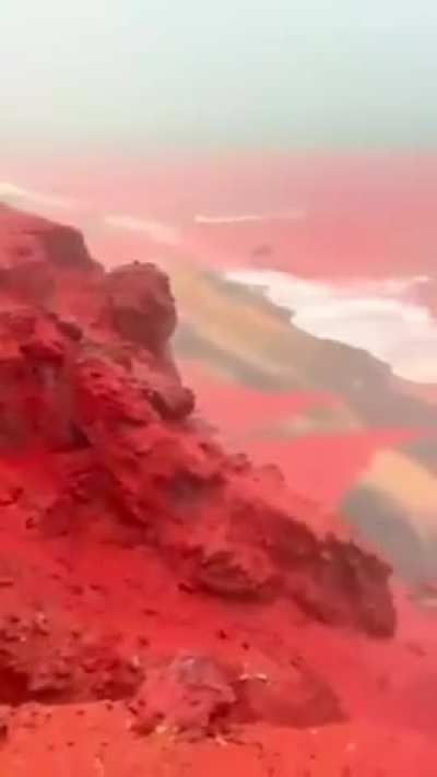 Heavy December Rains Turn Hormuz Island&rsquo;s Red Beach Sea Bright Red in Rare Natural Sight