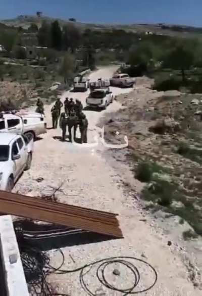 Dozens of Israelis infiltrate Syrian territory and climb onto the roof of a building in the village of Hader at the foot of Mount Hermon.