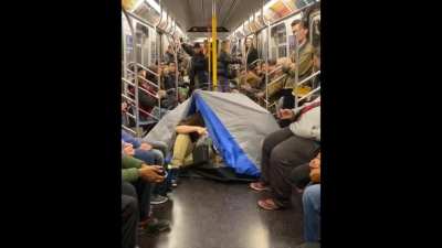 Going camping inside the subway train.