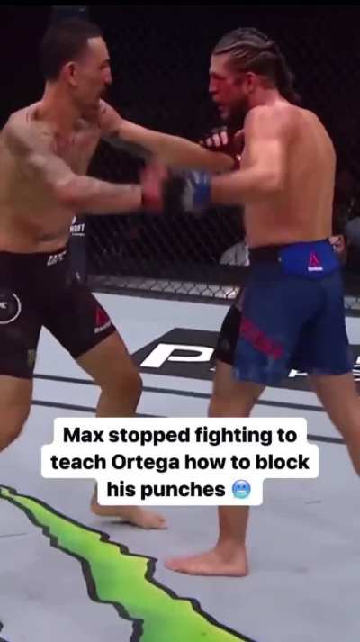 Max teaching Ortega how to block mid fight