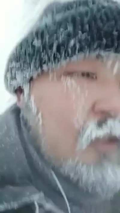 Guy recording himself taking a walk outside at -50°C in the coldest city in the world, Yakutzk.
