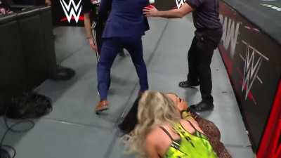 Becky Lynch laying out AJ Lee