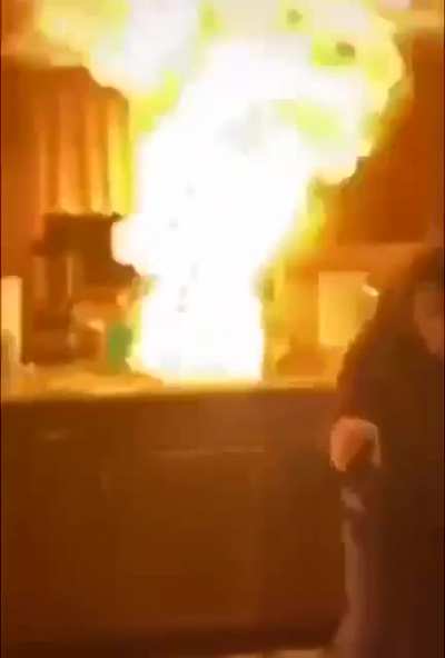She wanted to put out a grease fire under the tap, causes flashover.