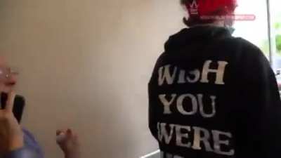 Karen and her husband sidekick do what they do best to guys making a video over Travis Scott burger