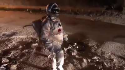 A man dressed as an astronaut to force pothole repairs
