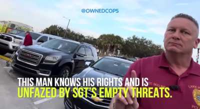 A Lake Placid Police Sergeant came in hot and bothered ready to run this man out of town. This man was simply standing on a public side-walk holding a sign that read 