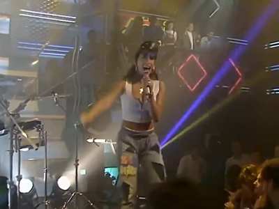 Sabrina Salerno, on Top of the Pops in 1988, singing "Boys (Summertime Love)"