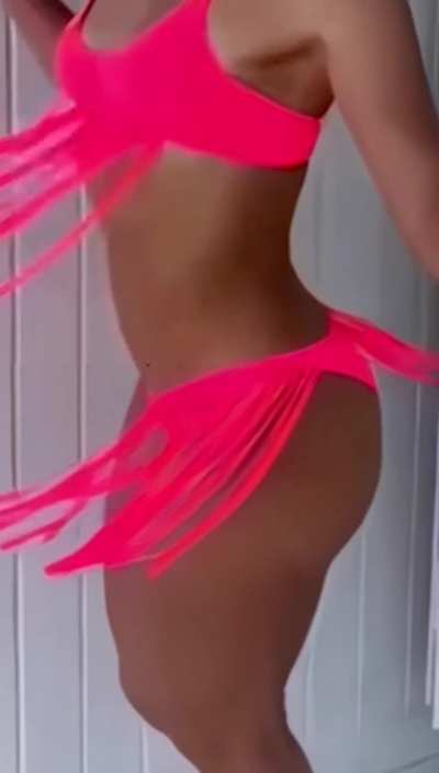 Shakira in her pink bikini