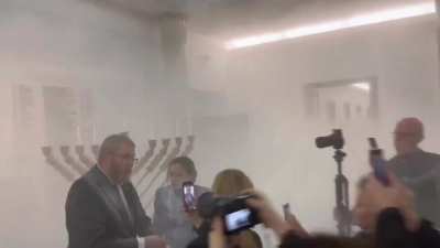 Grzegorz Braun - conspiracy theorist MP used a fire extinguisher to disrupt Hanukkah celebrations in the Polish Sejm