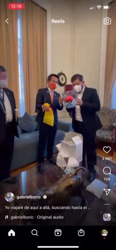 Japanese Embassy gives new young President of Chile Boric a Pok&eacute;mon Ball. Boric opens and finds a Squirtle.